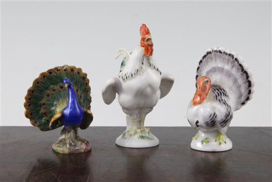 Three Meissen figures of a cockerel, a turkey and a peacock, late 19th century, 6.5cm-9cm